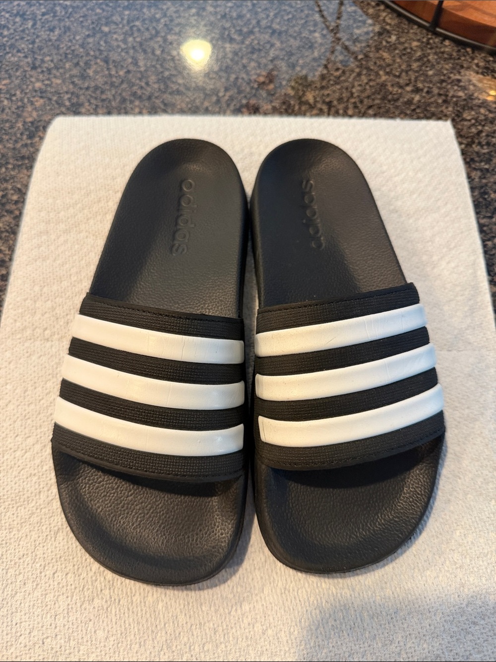 adidas Black Slides with White Three-Stripe Strap